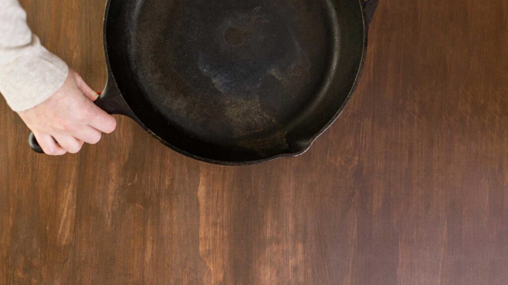 Taking out the rust to clean and season a cast iron skillet.