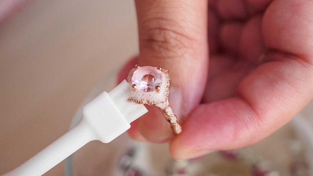 Using soap and water is how you can clean brass jewelry.