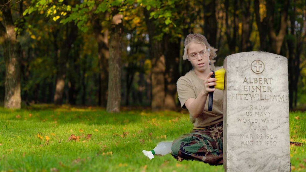 Soft brush is what you can use to clean gravestones.