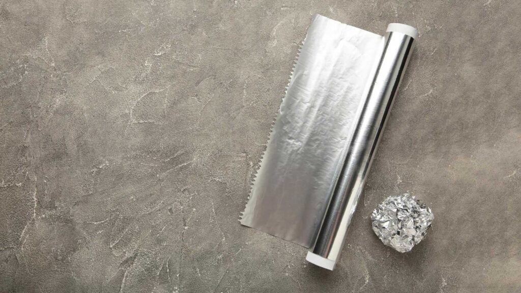 Using aluminum foil is a great way on how to clean grill grates.
