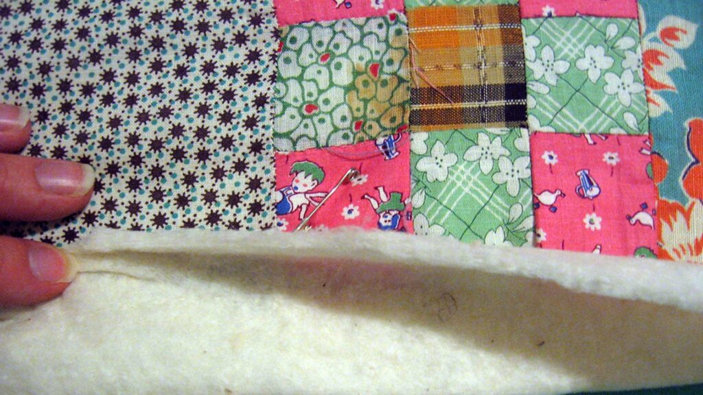 How you can clean stains from an old quilt?