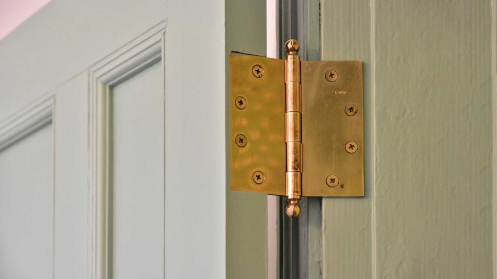 Guide on how to clean door hinges effectively.